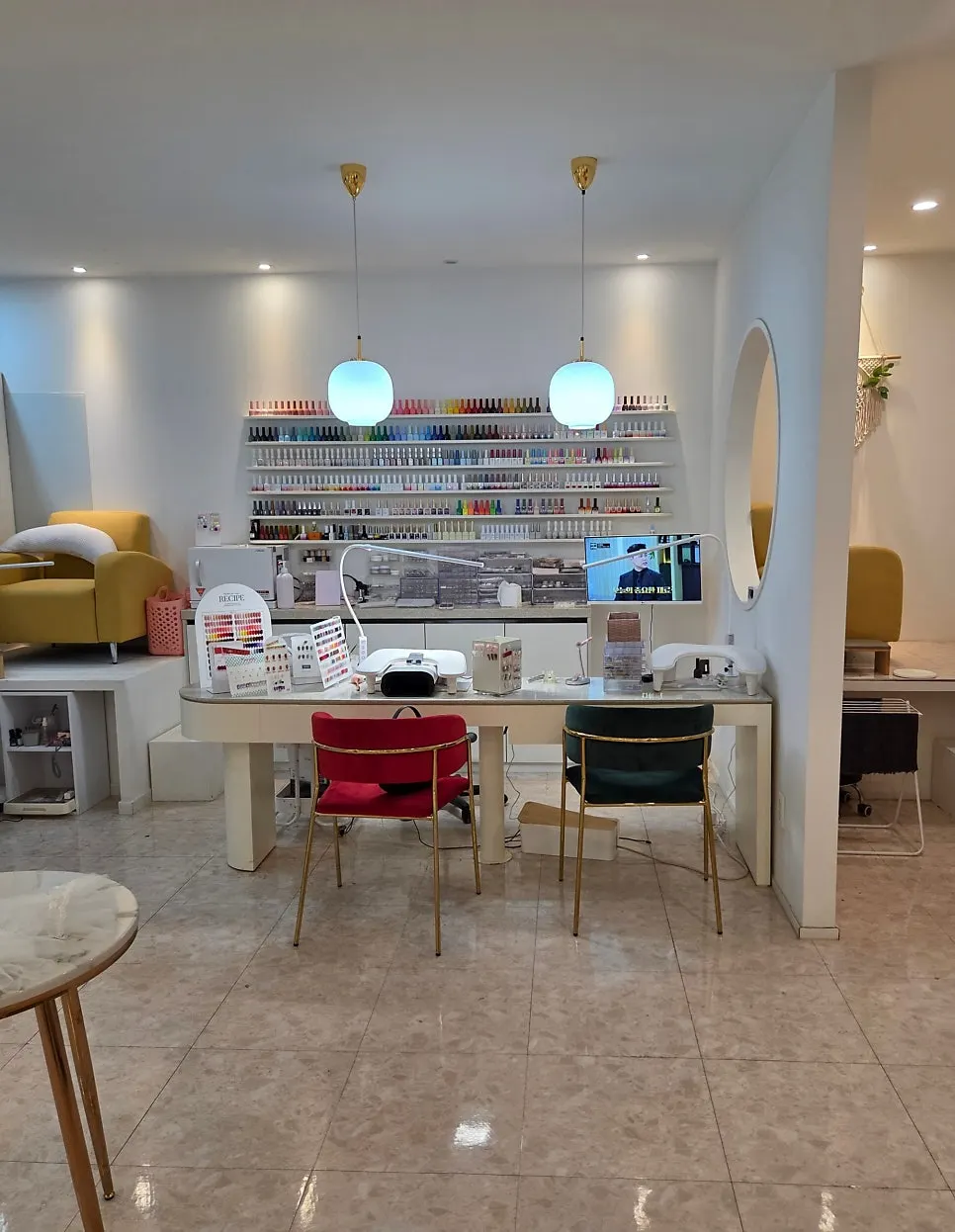 Interior of the shop with gel nail and syrup nail colors on display