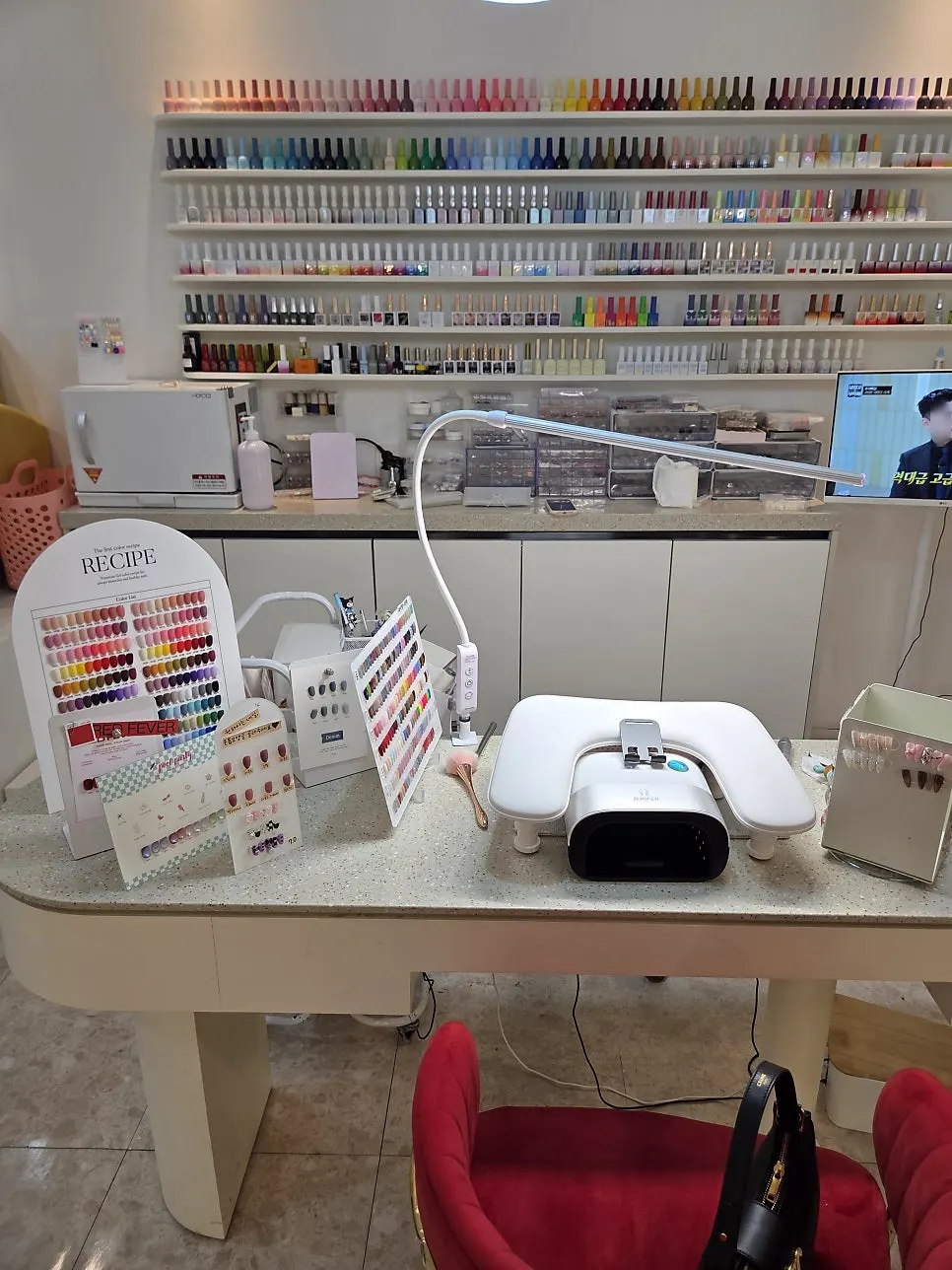 Interior view of the shop with nail service tables