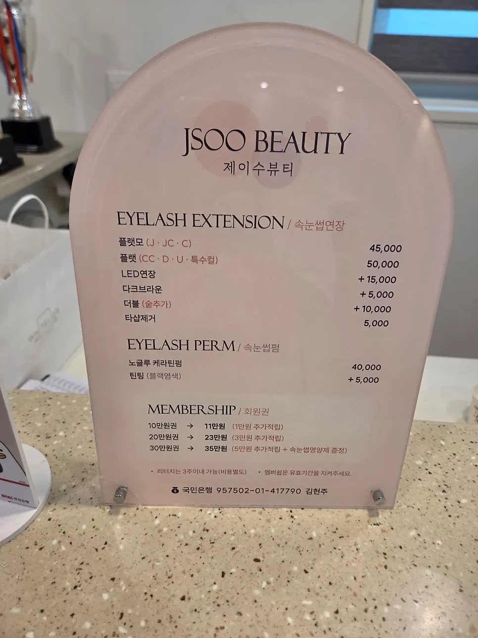 Price list for lash extensions and lash lifts posted in the shop