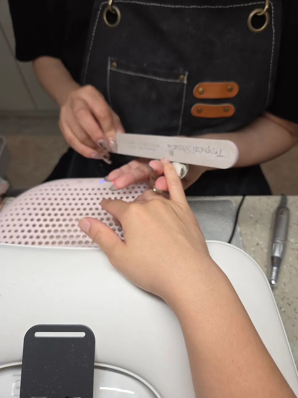 Basic nail care being performed