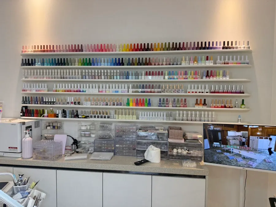 Wall display of various nail colors