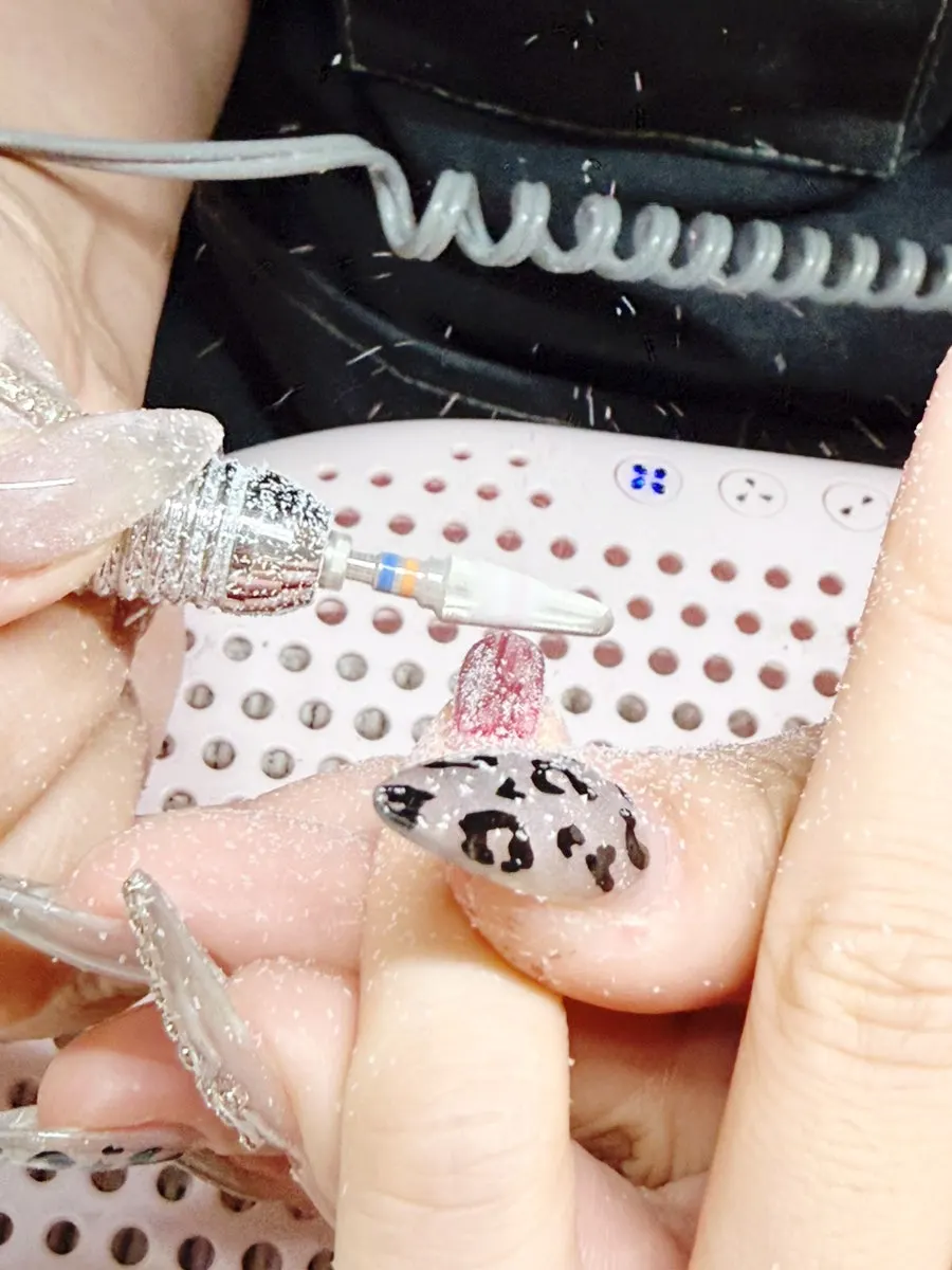 Removal of gel from another salon in progress