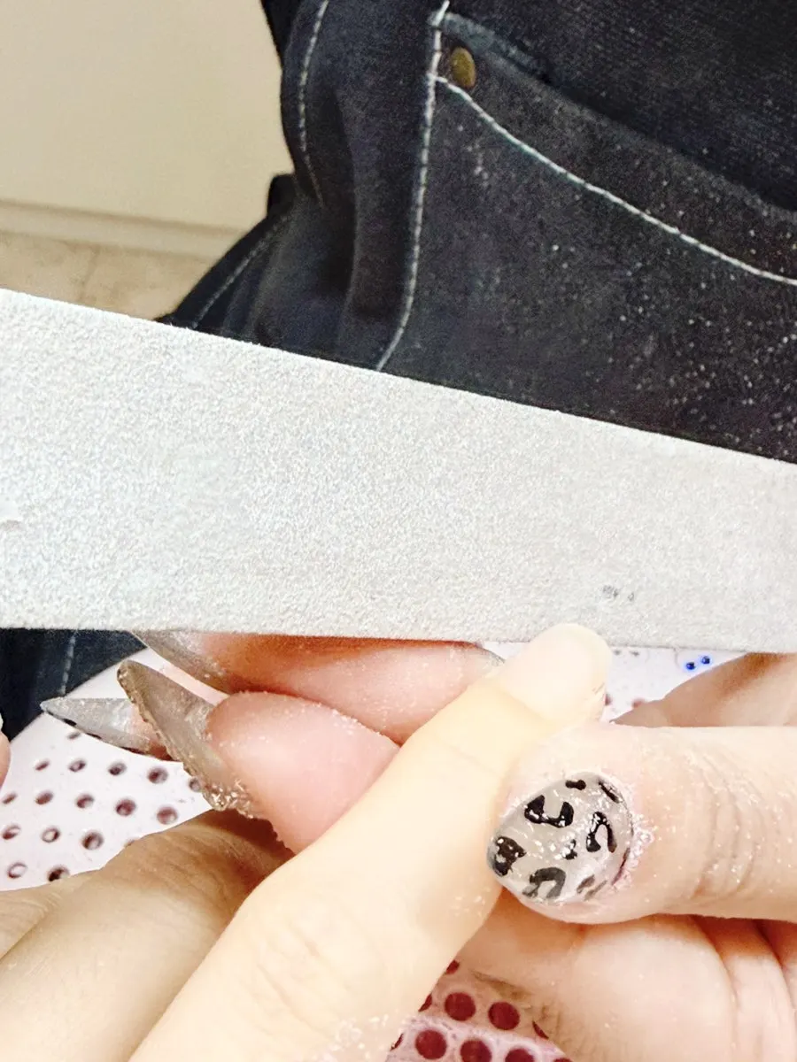 Checking nail condition while removing gel