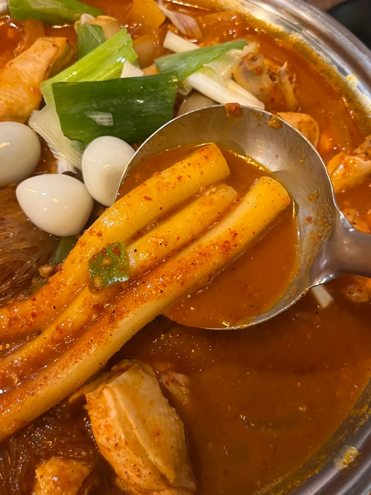 Spicy broth dakdoritang with rice cake strips