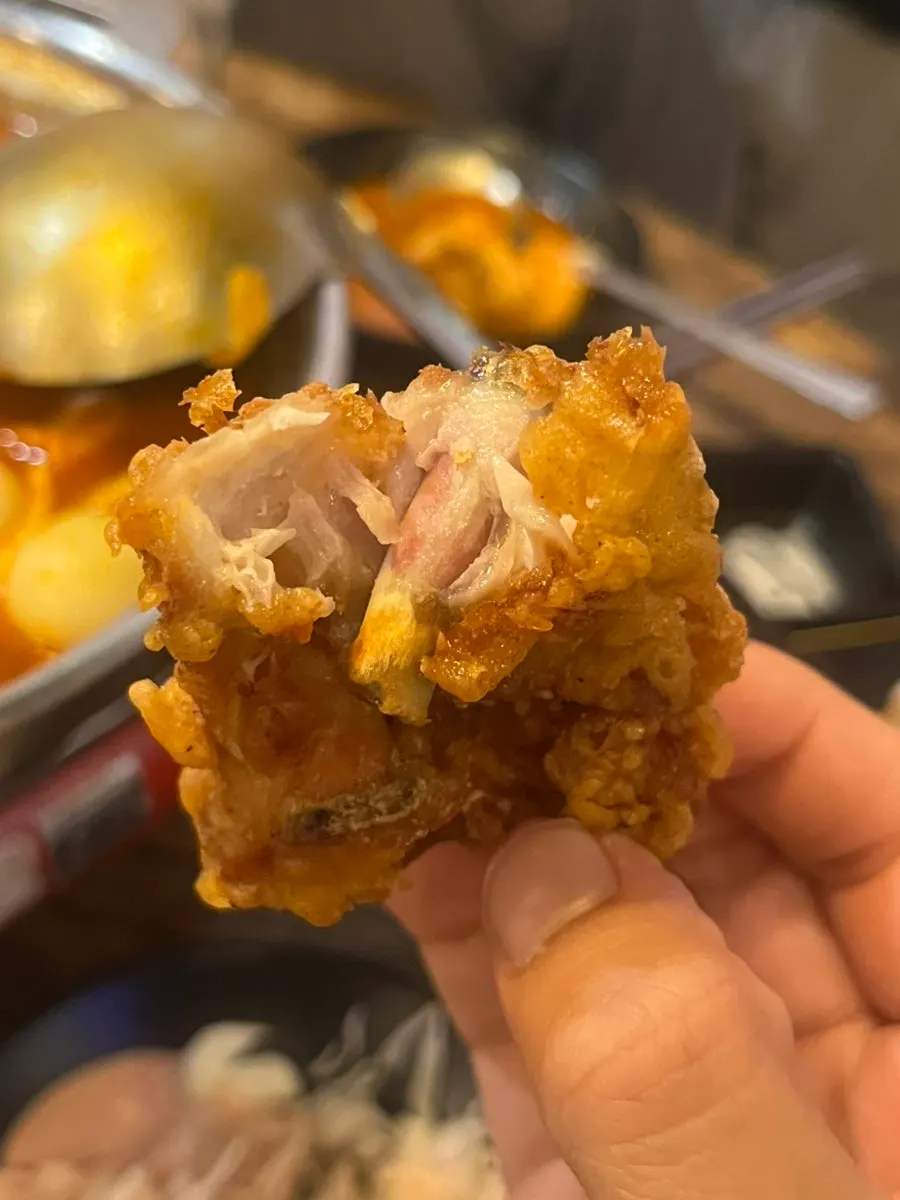 Tender meat inside the crispy batter of the fried chicken