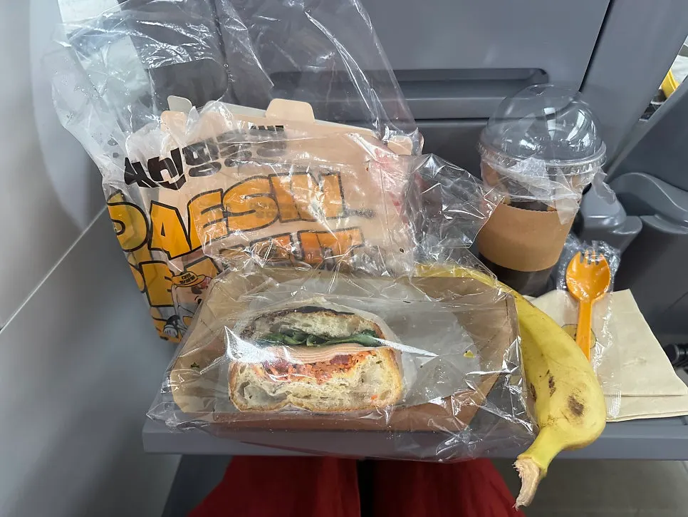 Packed box of peanut bread with a drink