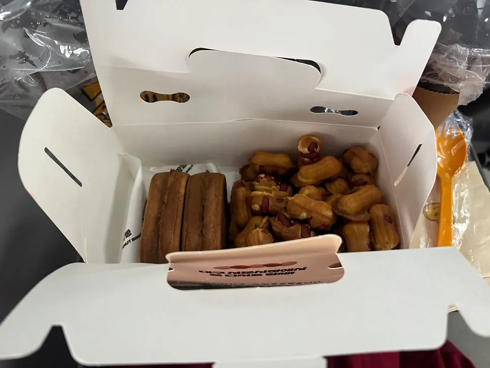 Warm egg bread and peanut bread in a box