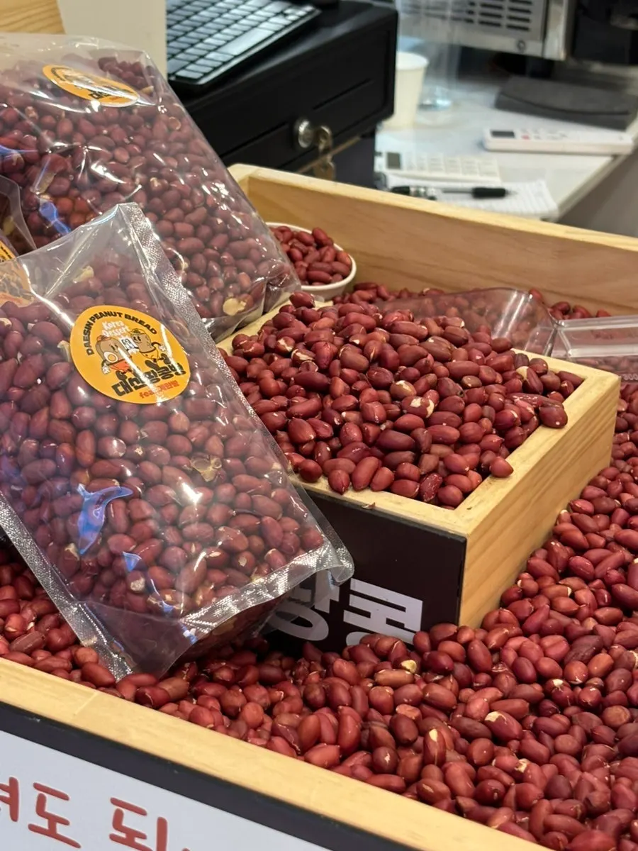 Display of roasted peanuts for sale