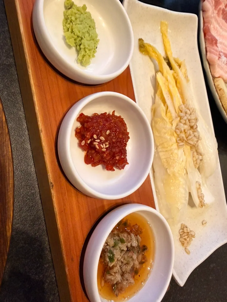 Salted sesame oil served alongside barley baek-kimchi