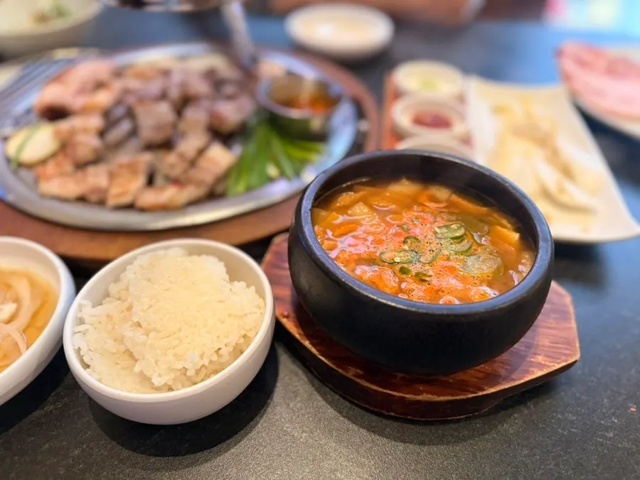 Pork ribs served with a bowl of rice