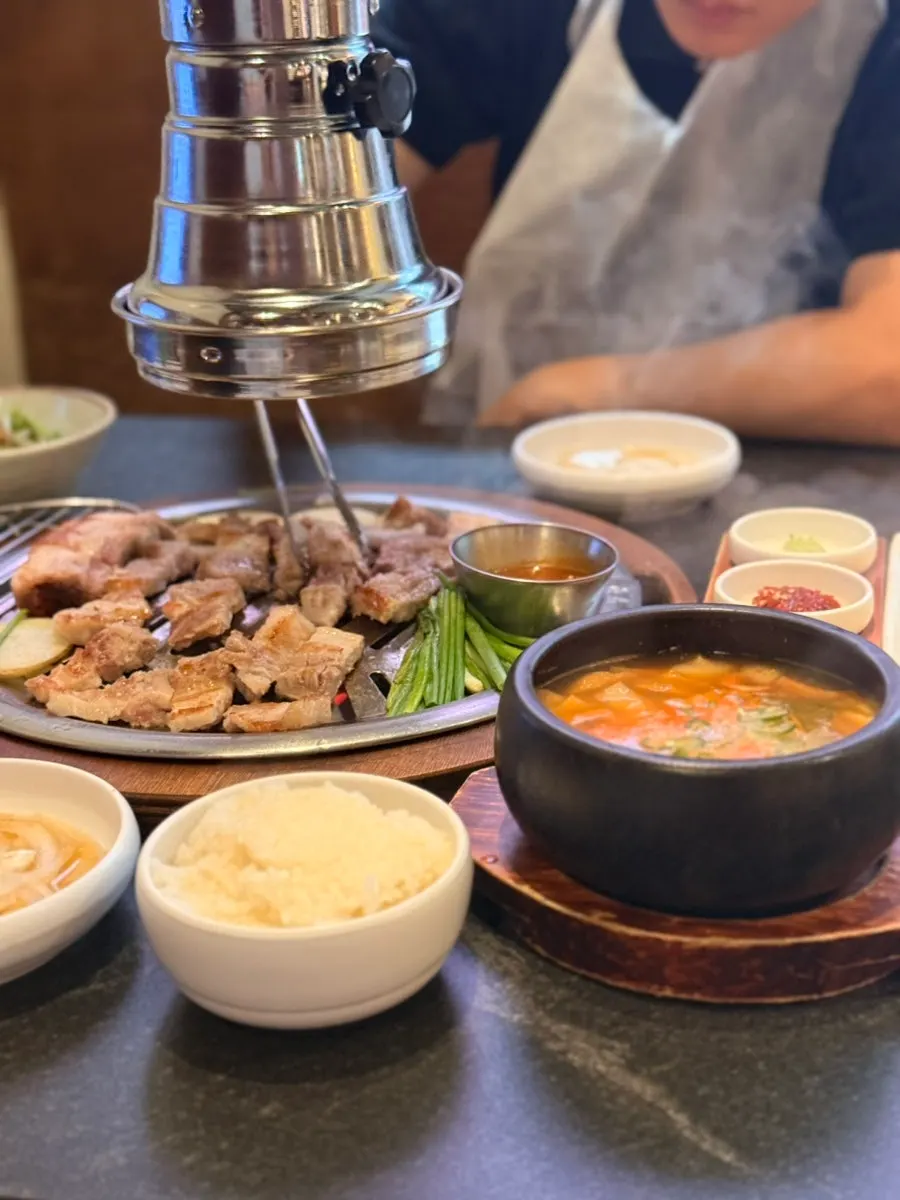 Table set with doenjang stew and rice to finish the meal