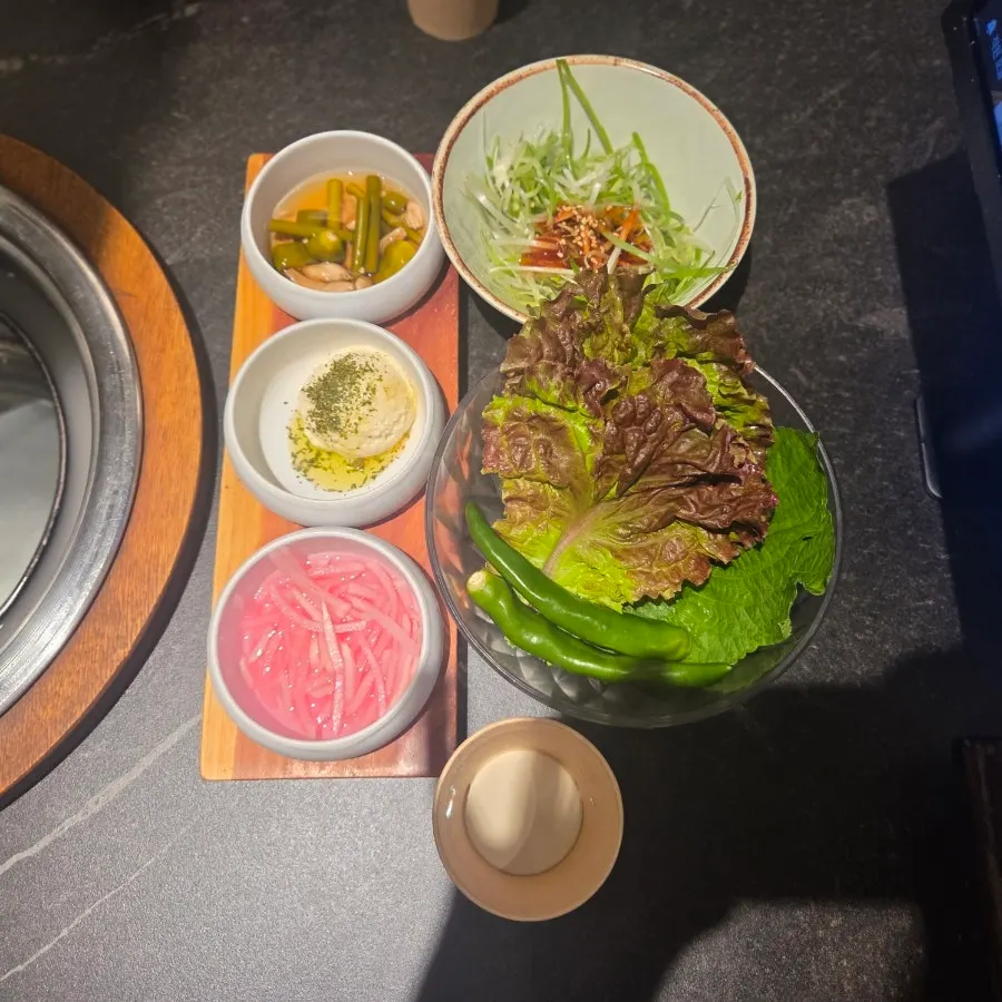 Basic side dishes set out with the marinated pork rib platter