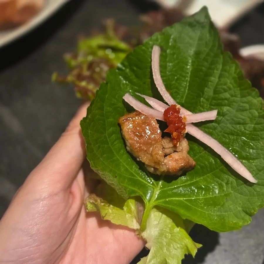 Fully grilled marinated ribs with lettuce wraps
