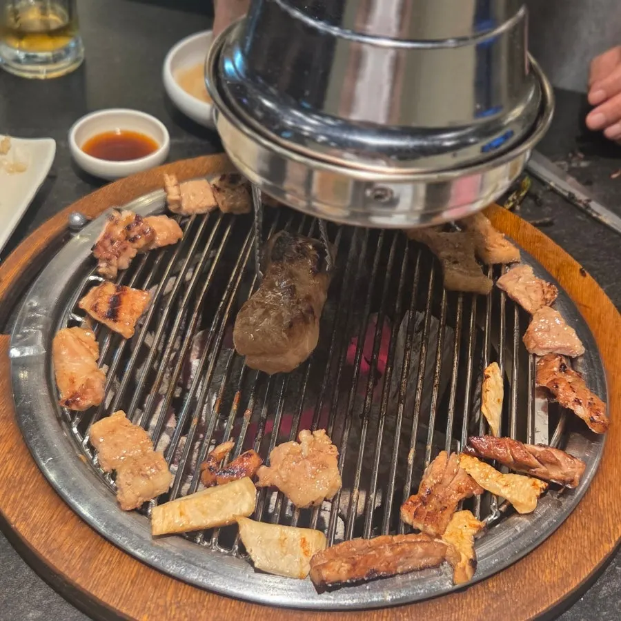 Full table spread with marinated ribs and stew