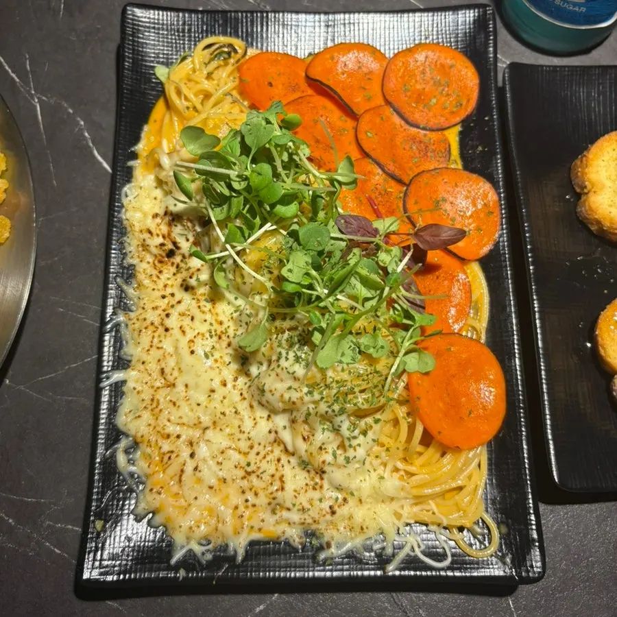 Small dish of fire chicken sauce served separately