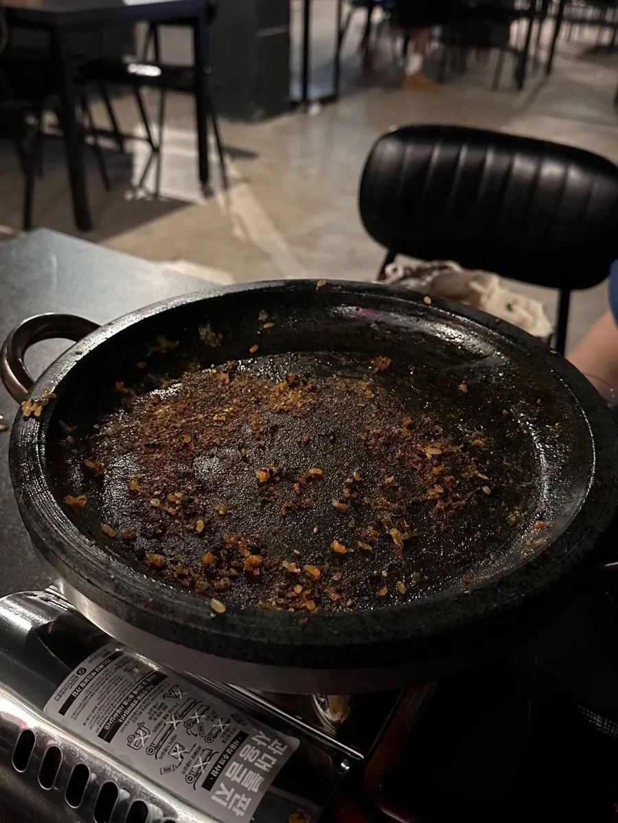 Crispy nurungji fried rice scorched onto the hot stone
