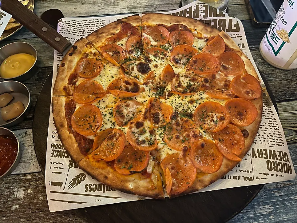Pizza and beer atmosphere at the Seomyeon pub