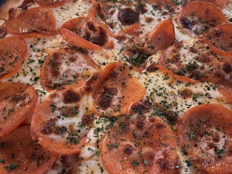 Switching between pizza and nachos during the drinking session