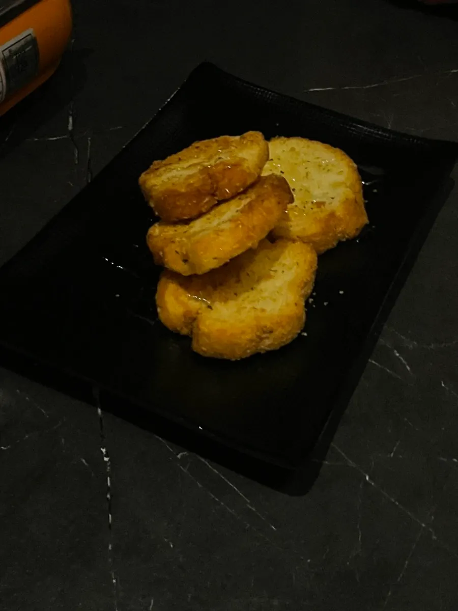 Garlic butter baguette served as a basic side dish
