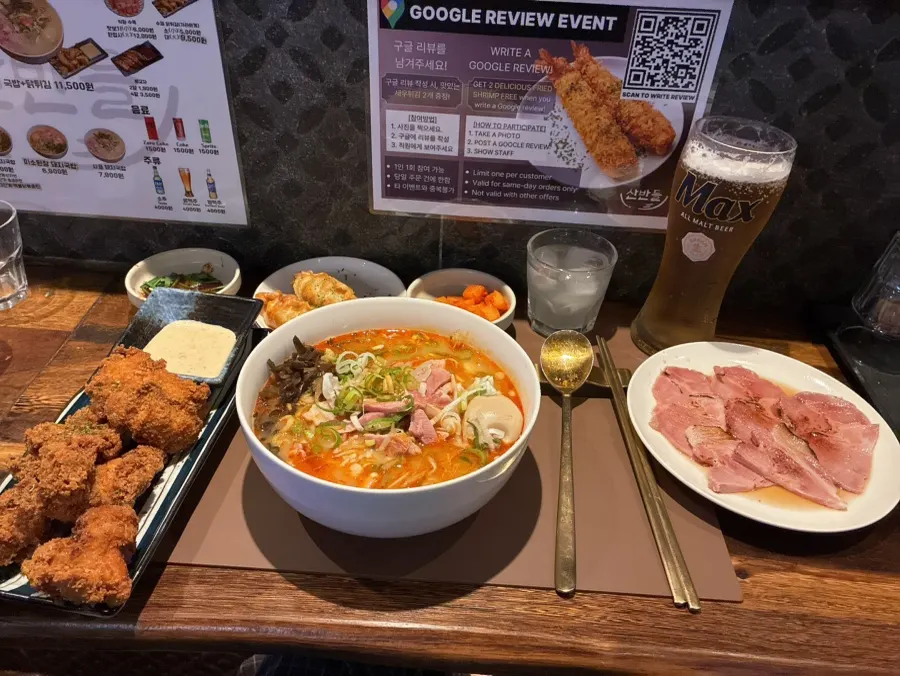 A neatly plated gukbap meal on the bar table