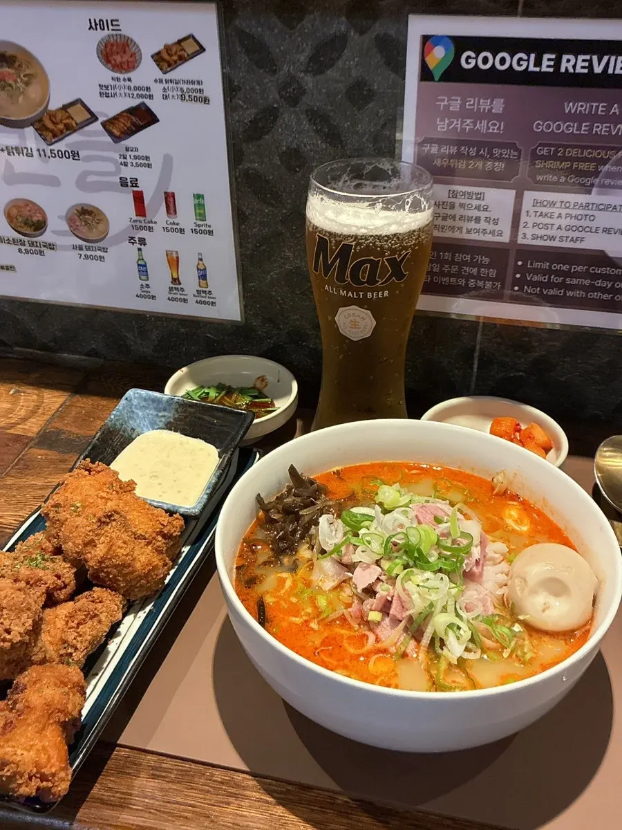 A glass of Sanbandeul's cream draft beer
