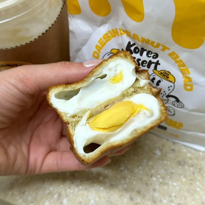 Cross-section of egg bread with a whole egg inside