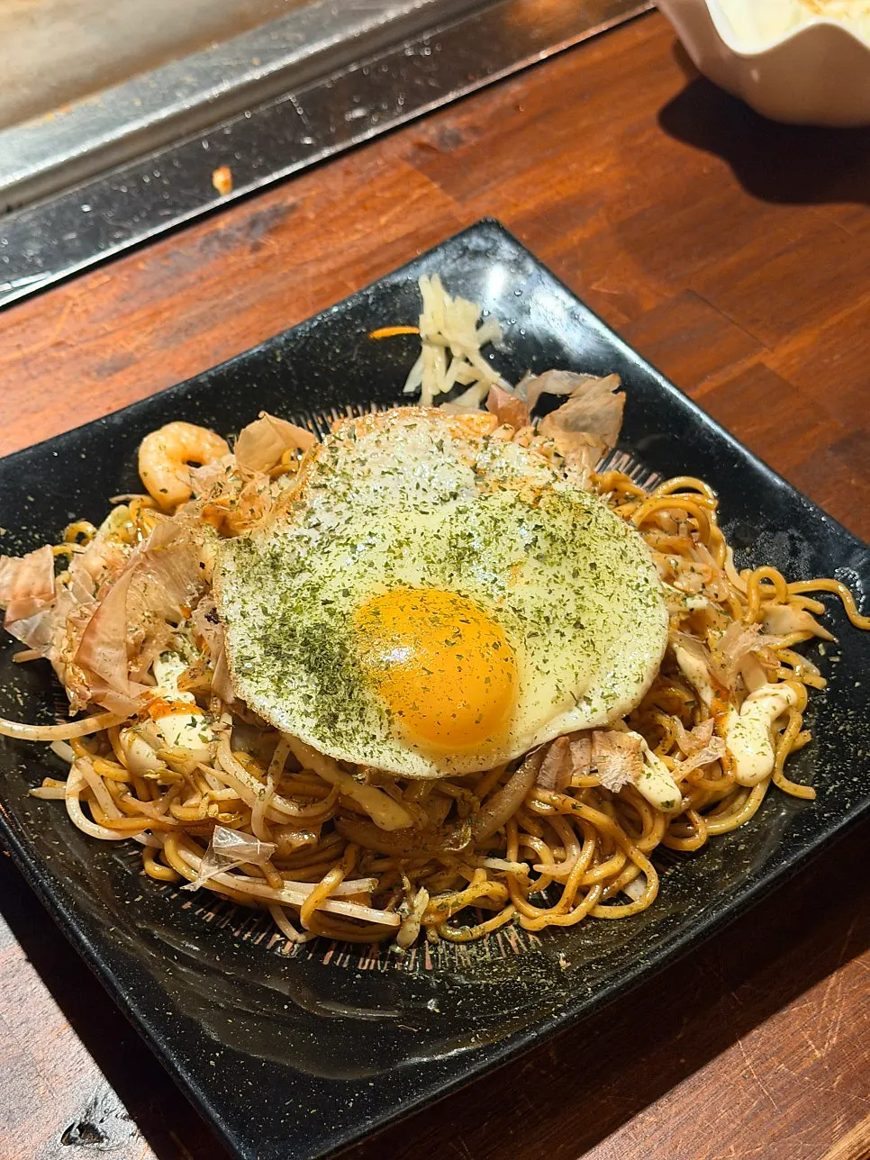 Table setting with horumon-yaki and yakisoba