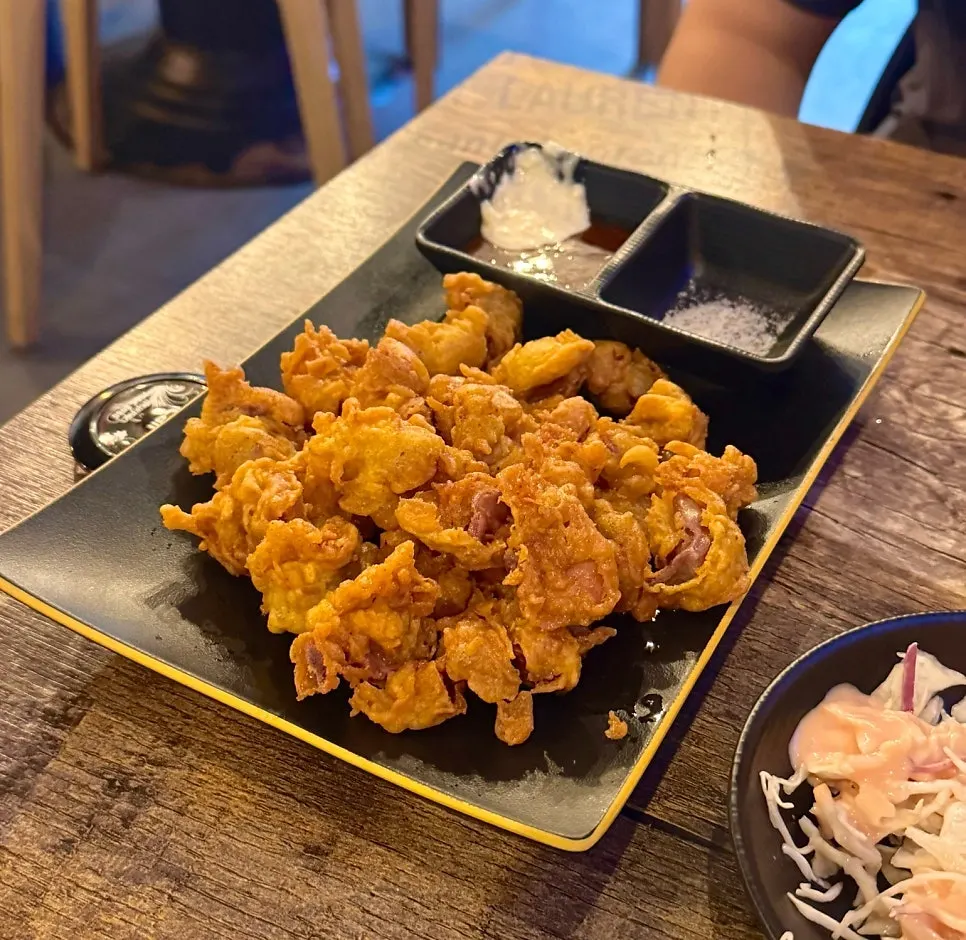Table set with shrimp chips and side dishes
