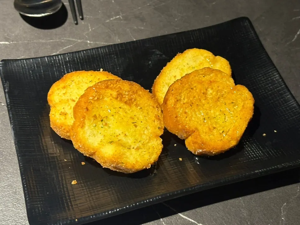 Complimentary garlic bread