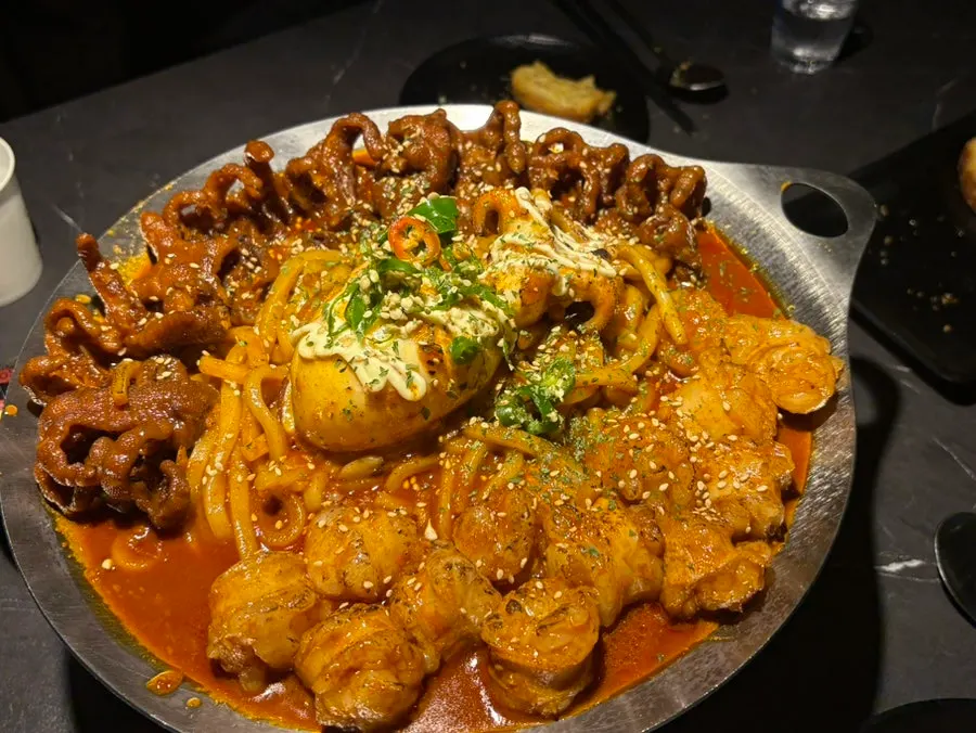 Odaebal topped with whole cuttlefish