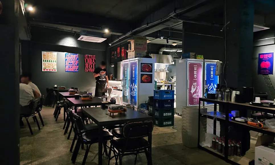Spacious hall seating with a view of the open kitchen
