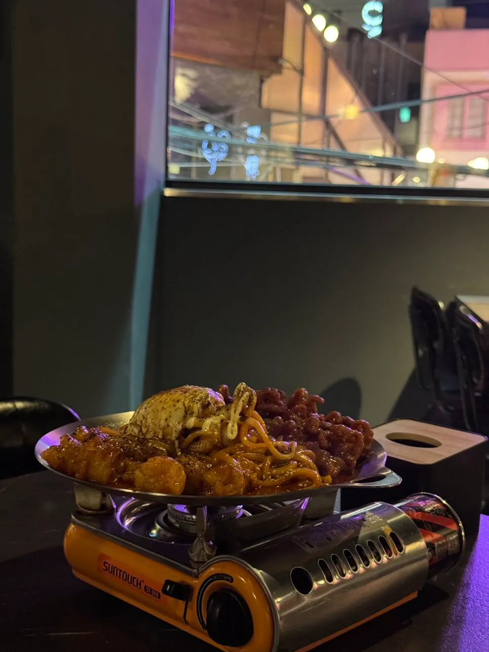A plate of O-Dae-Bal with beef intestine, chicken feet, and cuttlefish