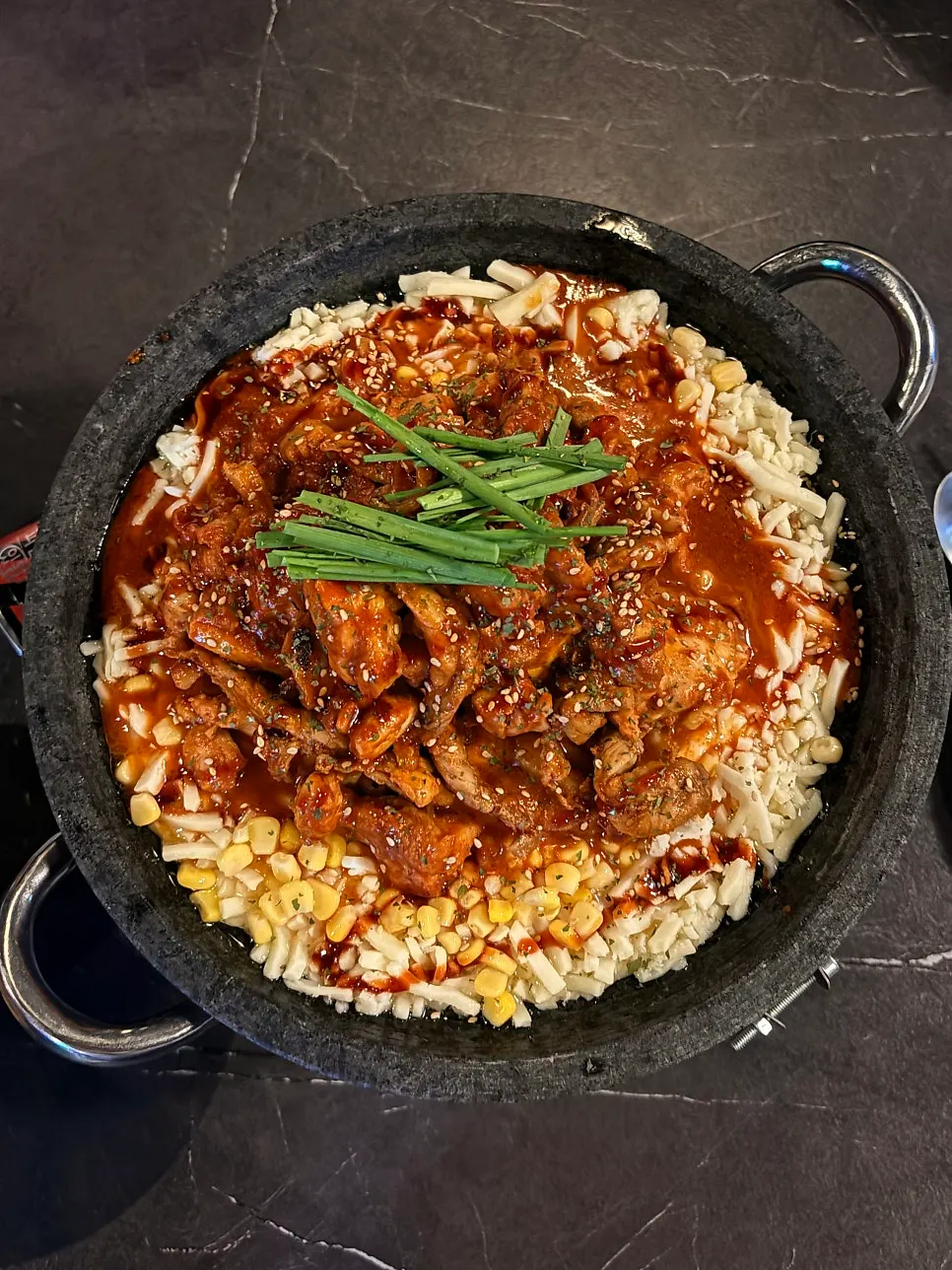 Sweet-and-spicy sauce with stretchy cheese