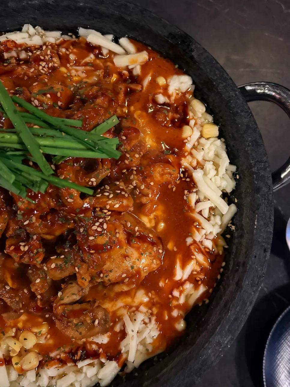 Chicken thigh and neck meat topped with chives