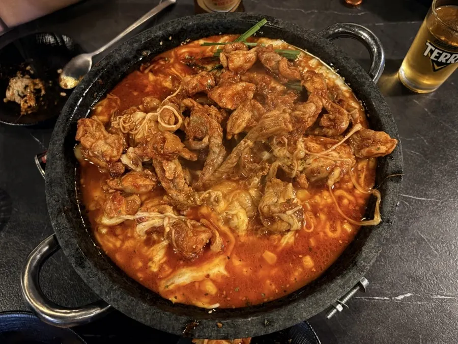 Drinking table set with cheese and chicken thigh meat