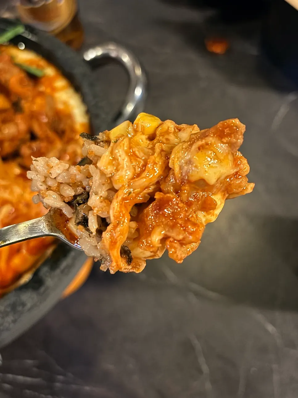 Sauce mixed with rice ball and cheese to finish the meal