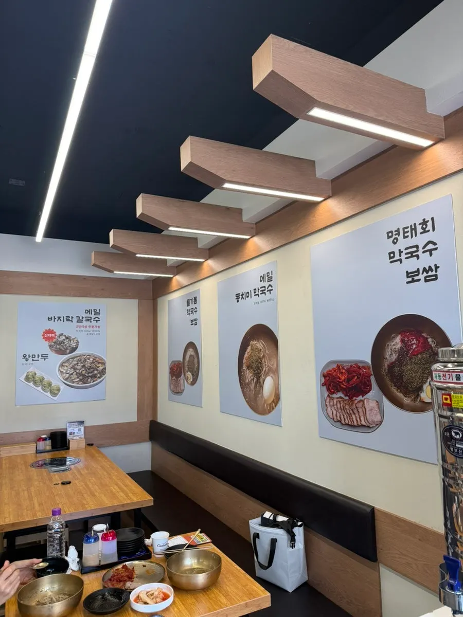Dining hall filled with customers eating