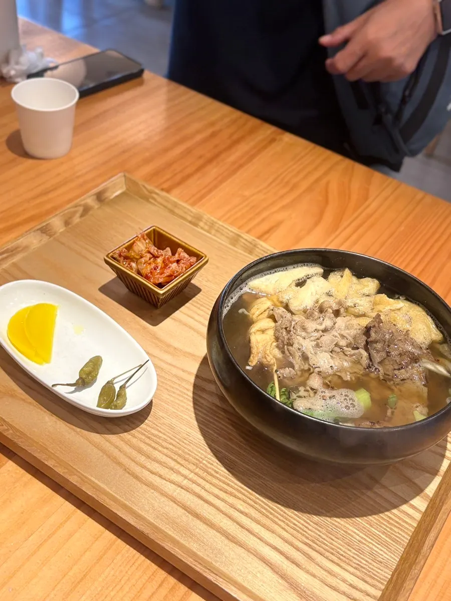 A bowl of charcoal beef udon full of smoky aroma