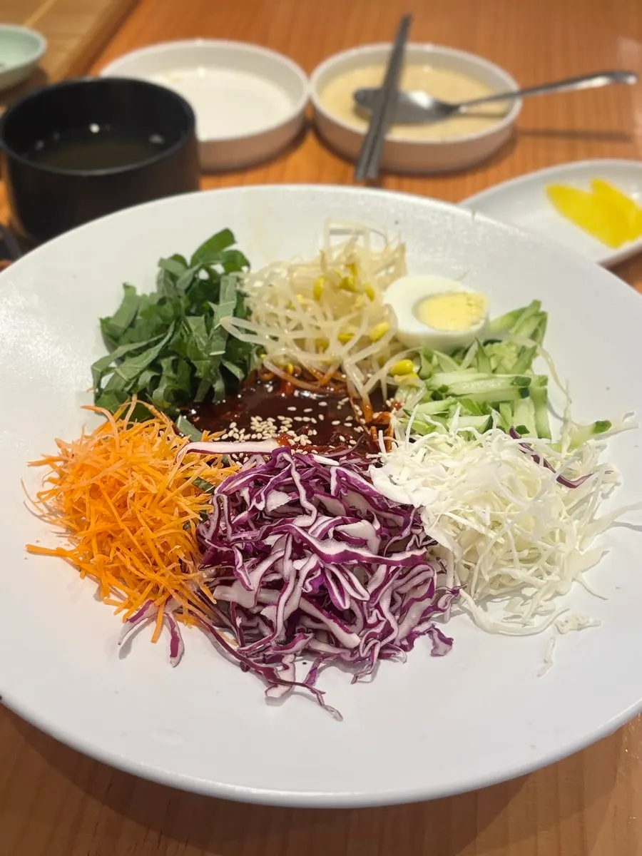 Spicy bibim jjolmyeon loaded with vegetables