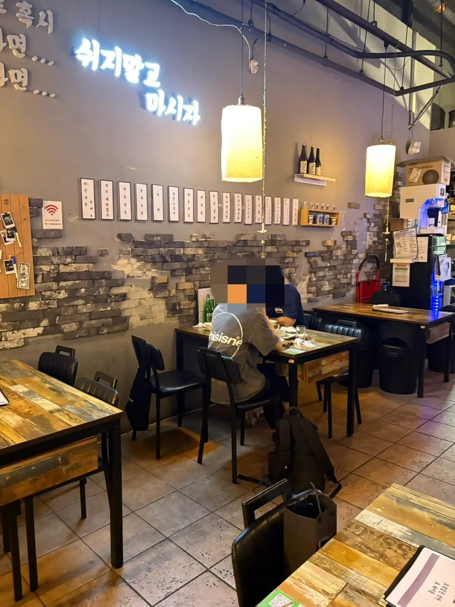 Interior of Pocha Dubai with large floor-to-ceiling windows