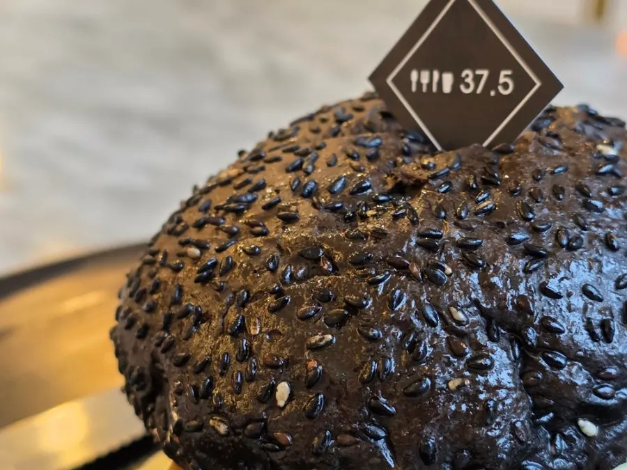 Gourmet black cheese burger with black bun