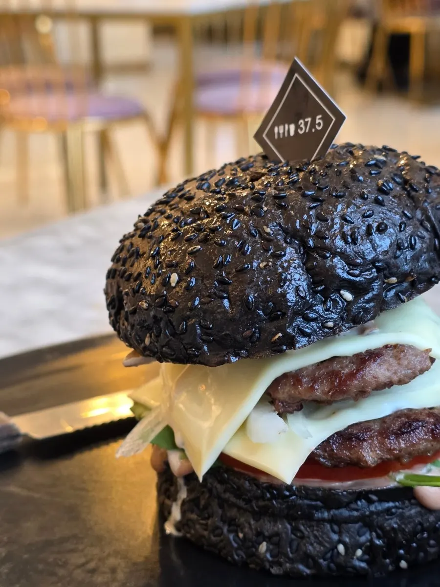 Cross-section of the cheese burger cut in half