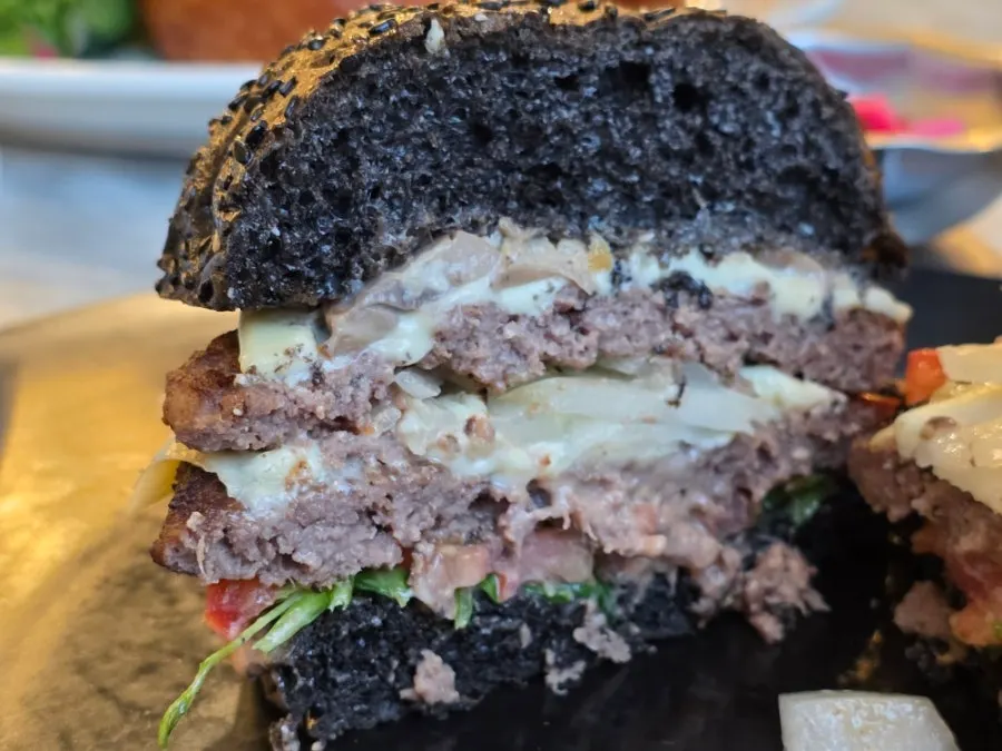 Fillings inside the two-patty two-cheese burger