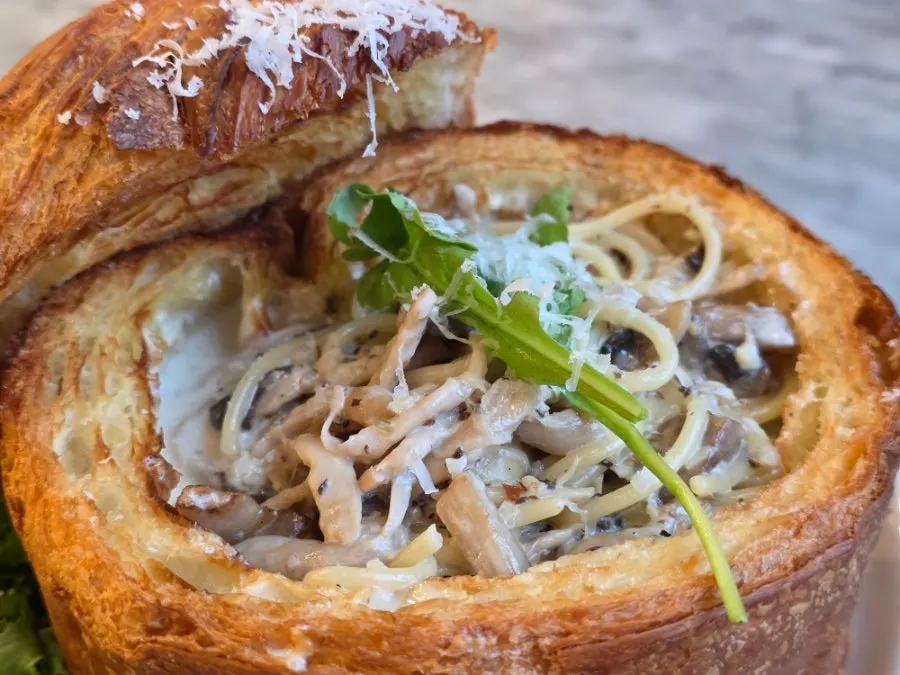 Truffle cream pasta served in a Mont Blanc