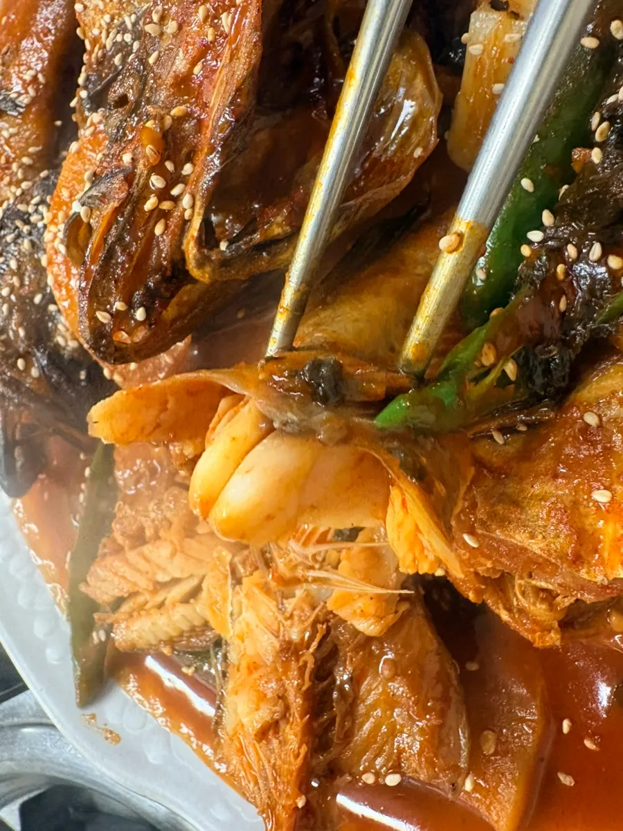 Close-up of sauce-soaked kodari flesh