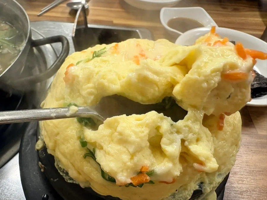 Cheese steamed egg puffed up in the pot