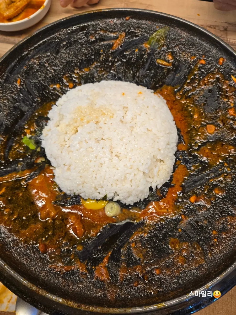 Fried rice with added seaweed flakes and egg