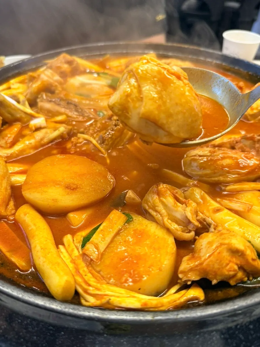 Sauce-soaked potatoes in Sottture's dakdoritang