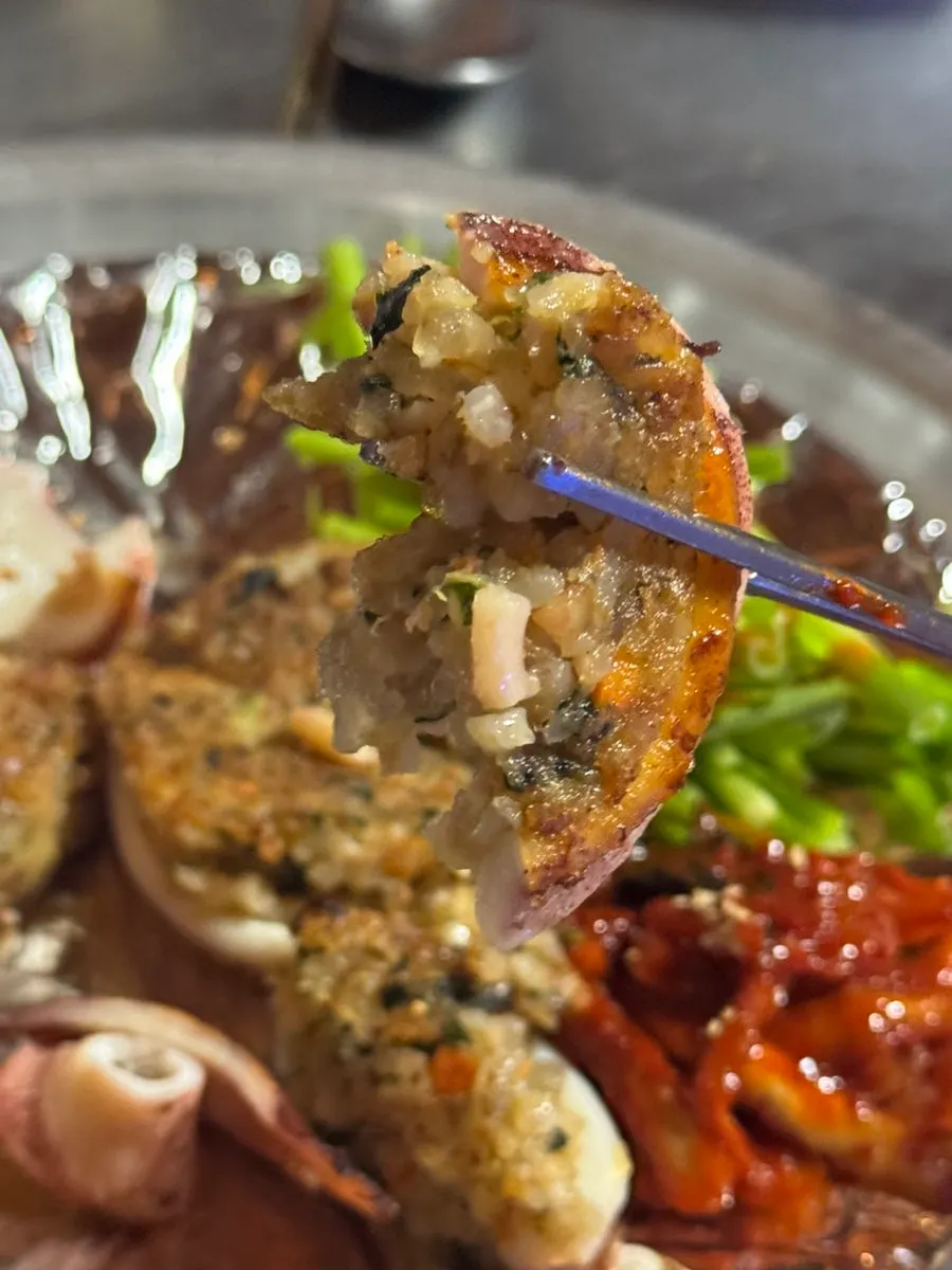 Cross-section of a squid nurungji sundae packed with filling