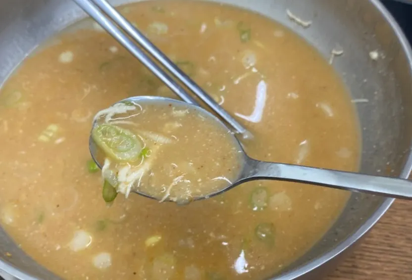 A nearly empty bowl of spicy chicken kalguksu